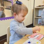 young girl making art