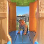 young child on playset