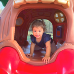 young girl on playset