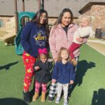 teacher with children outside