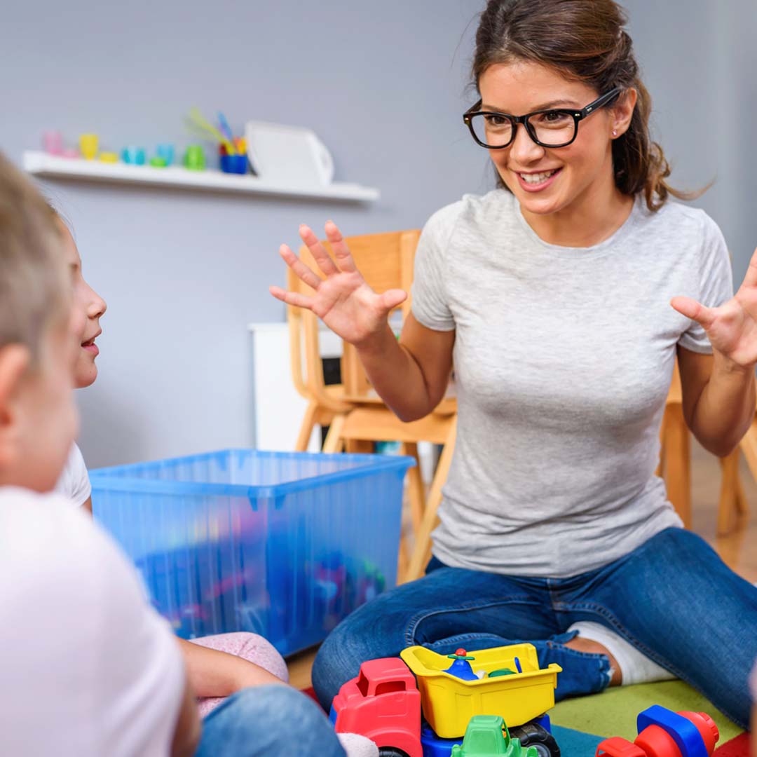 teacher playing with kids