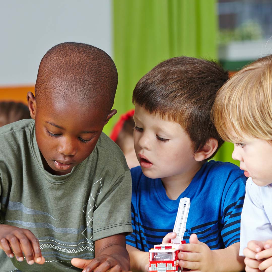 three boys playing