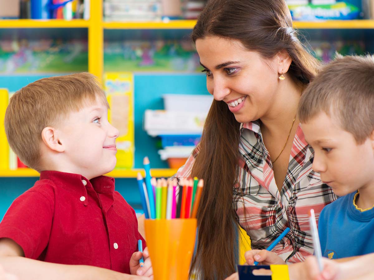 Student smiling at teacher