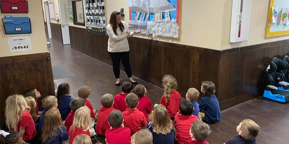 PCA teacher instructing class