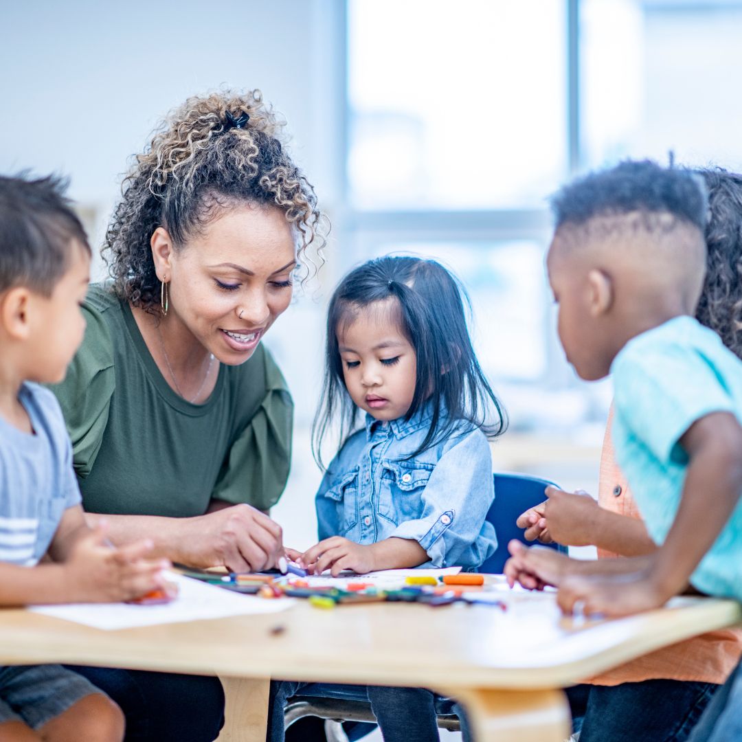 a teacher working with children