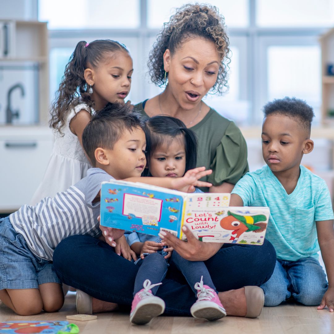 woman reading to children