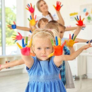 children with paint on their hands