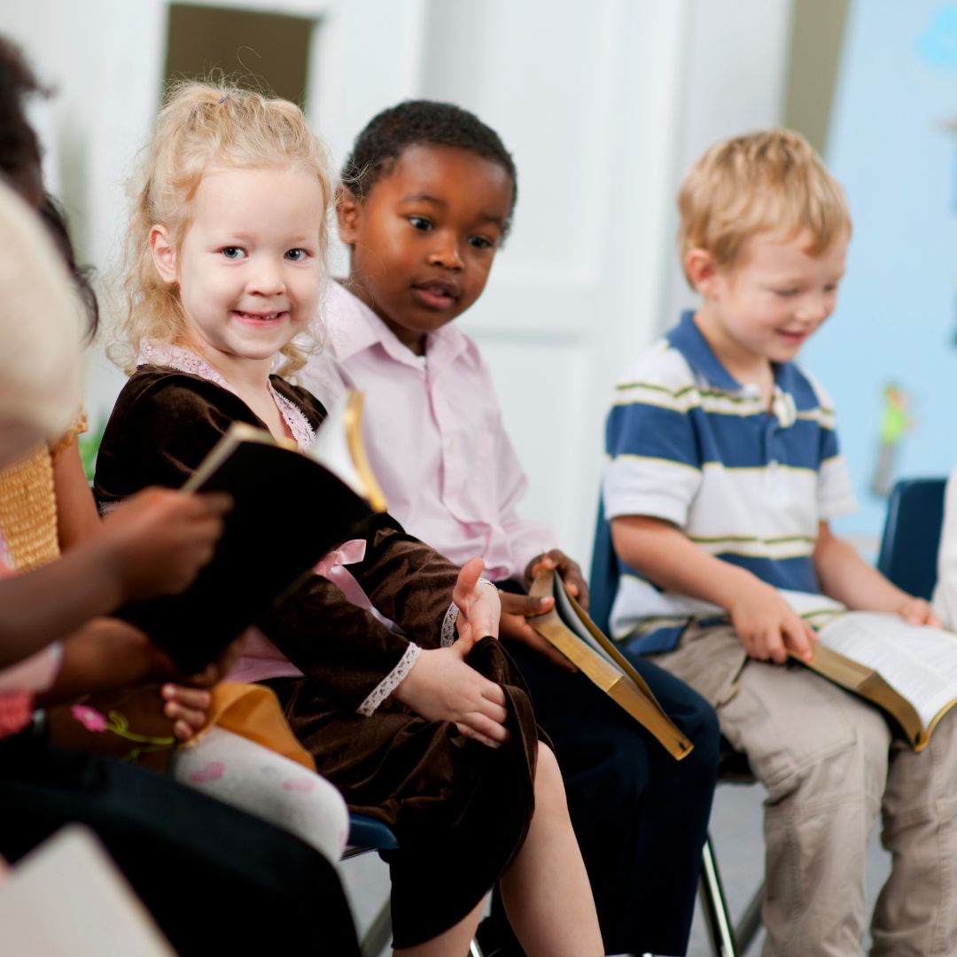 instructor reading to children