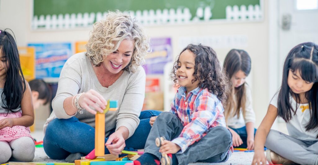 teacher with preschool students