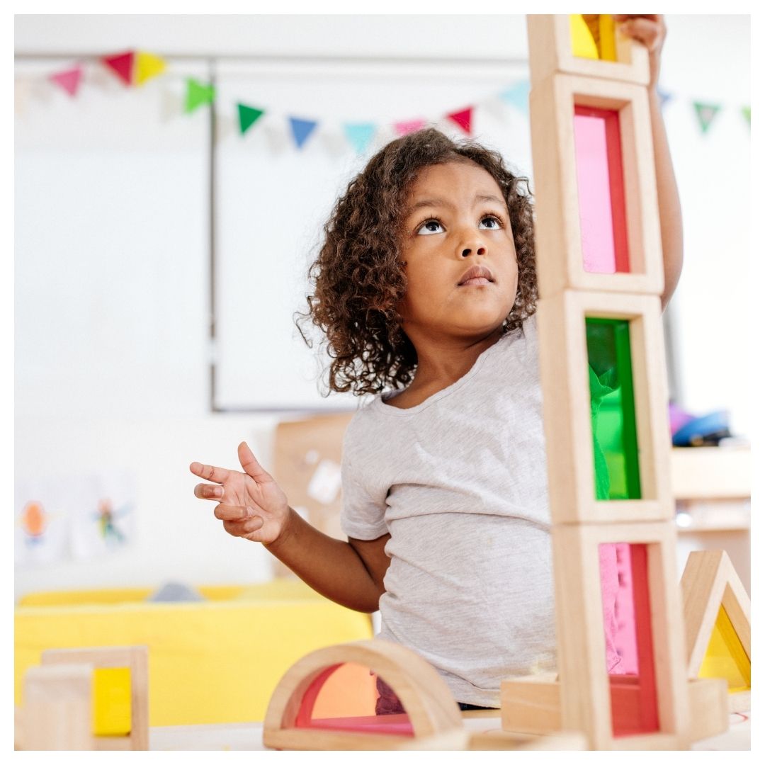 child playing at preschool