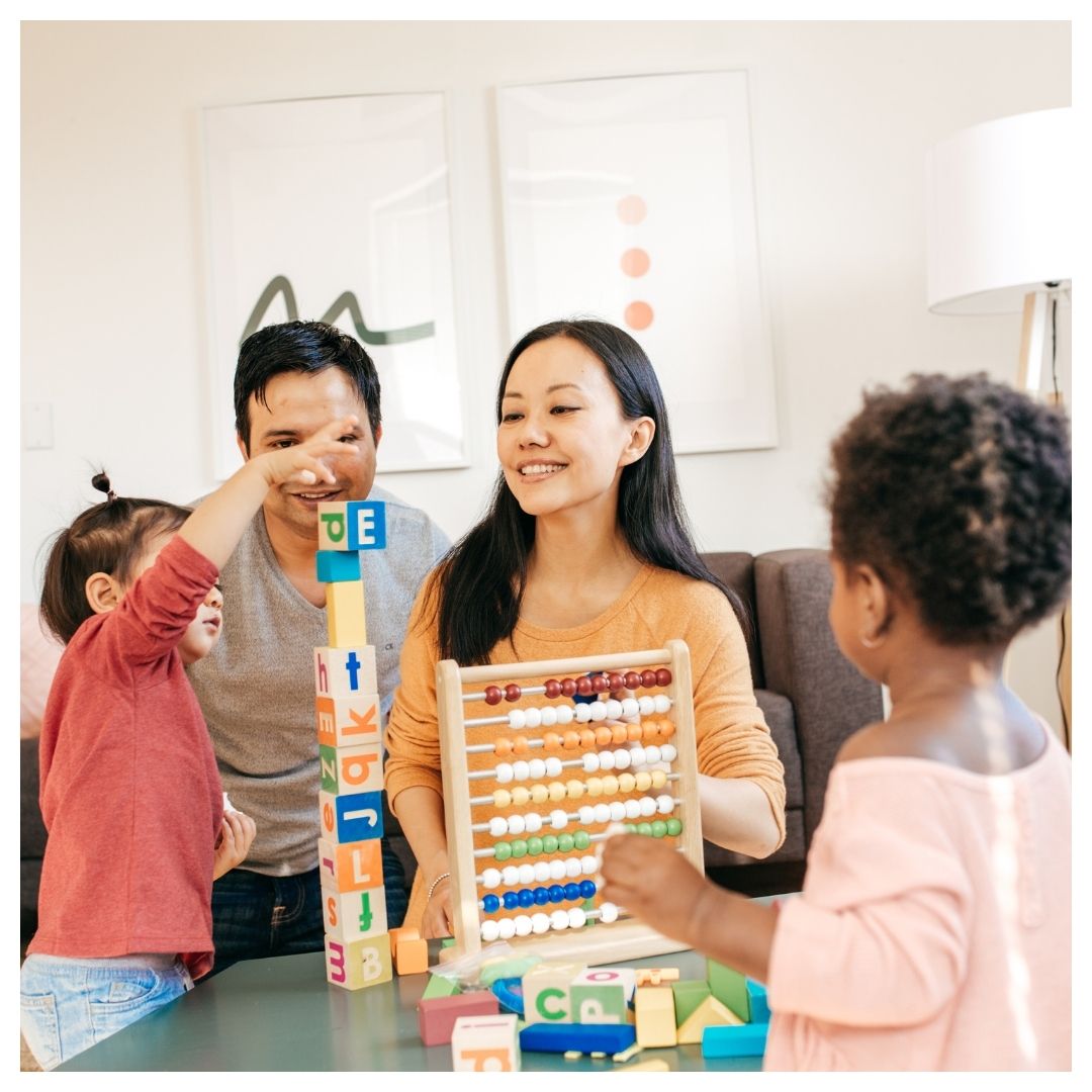 parents playing with children