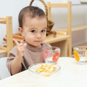 Female toddler at the dinner table