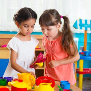 Two girls working together