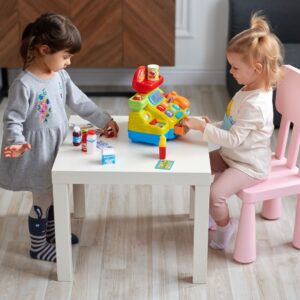 children sharing and playing with each other in an early learning classroom