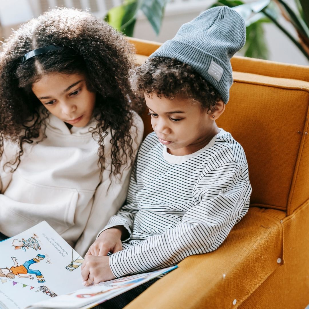 two children reading together